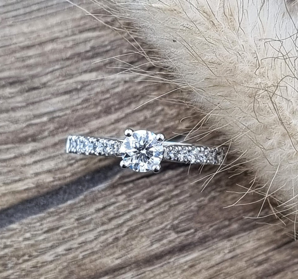 Round brilliant cut diamond solitaire ring
