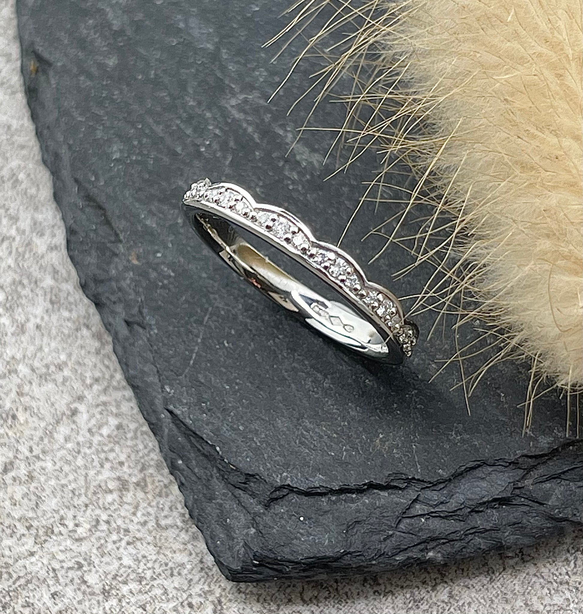 Scalloped edge diamond set band