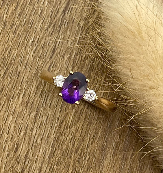 Oval amethyst and diamond ring