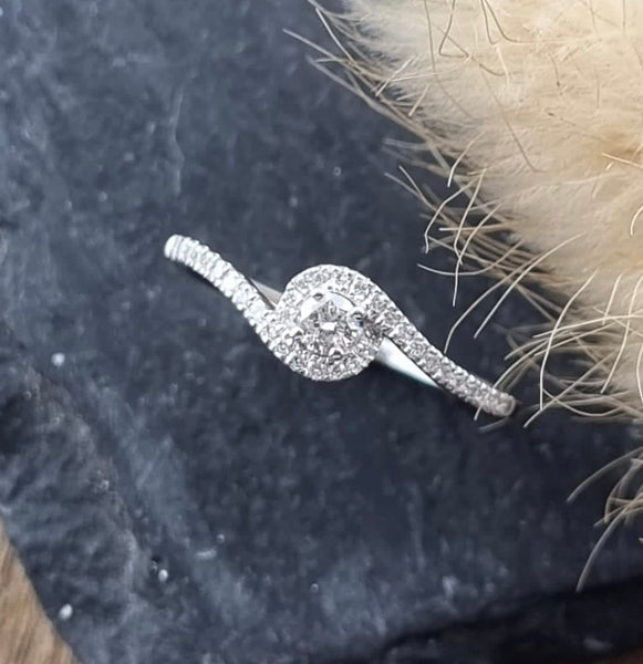 Twist style diamond ring