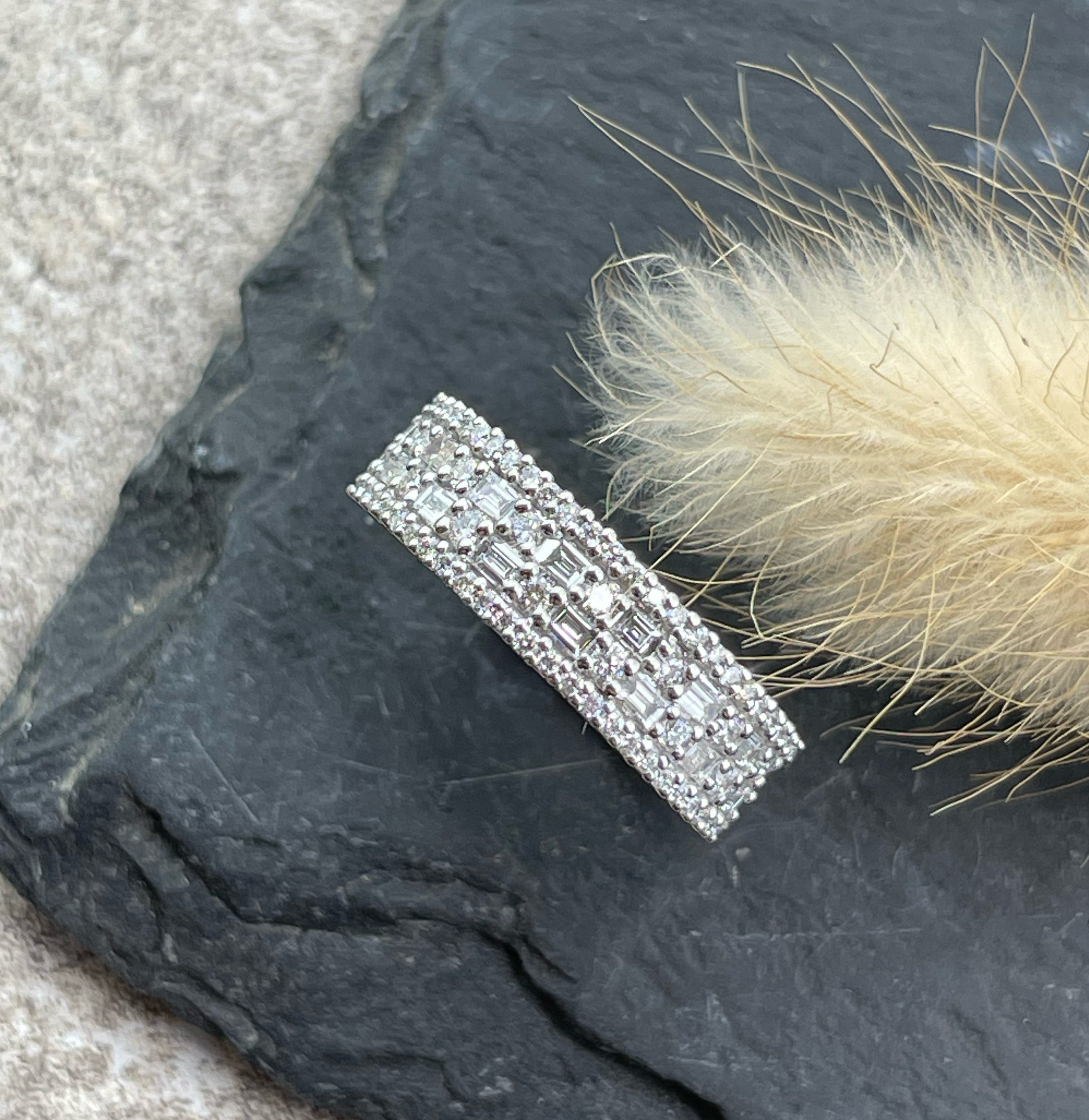 Baguette and round diamond dress ring