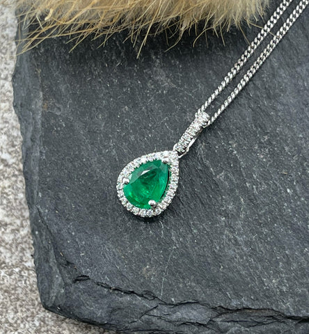 Emerald pear shaped halo pendant