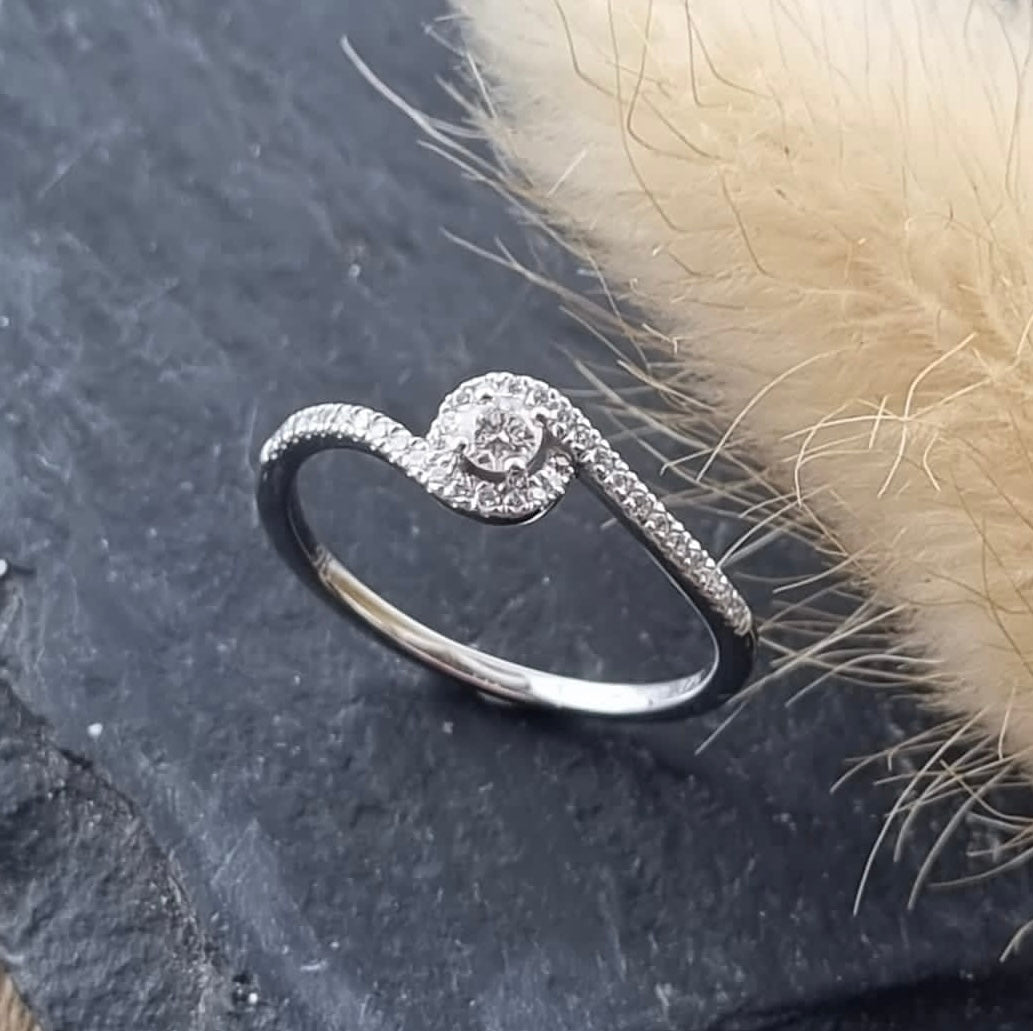 Twist style diamond ring