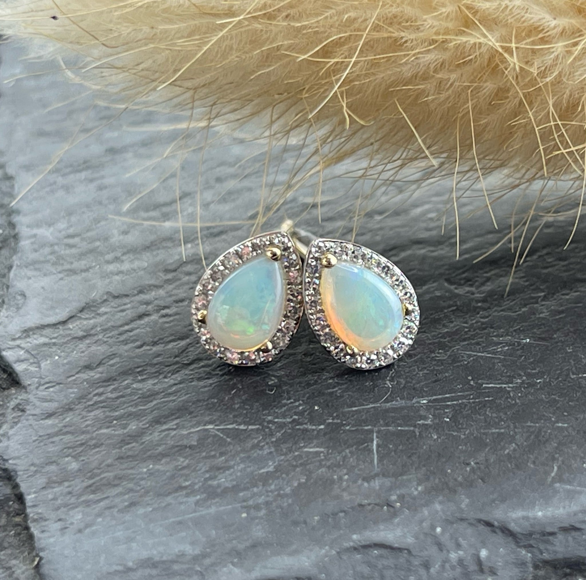 Pear opal halo stud earrings
