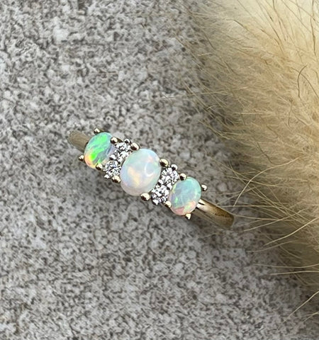 Oval opal and diamond dress ring