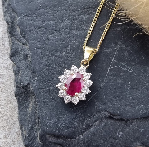 Oval ruby and diamond cluster pendant