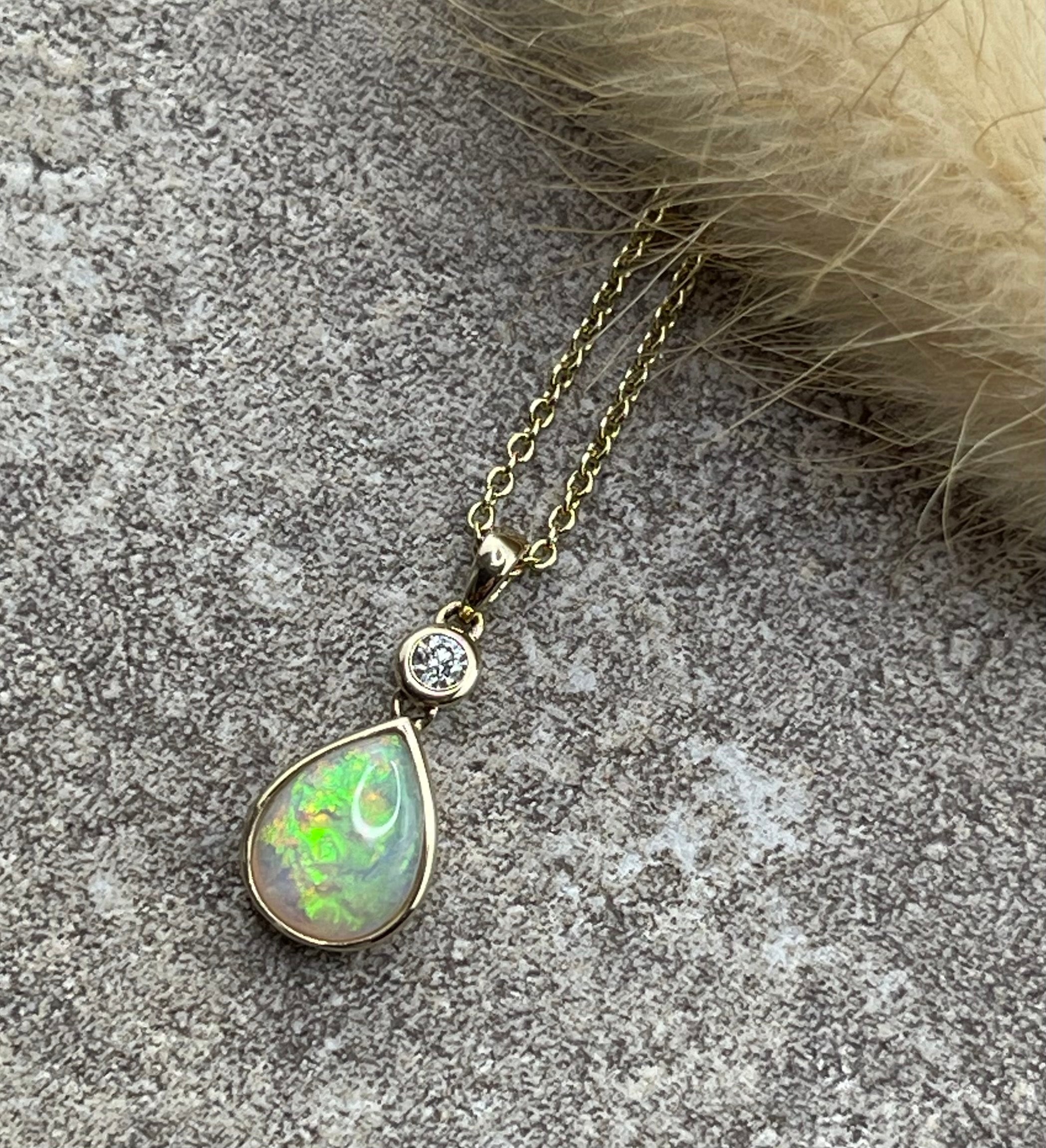 Pear cut opal pendant