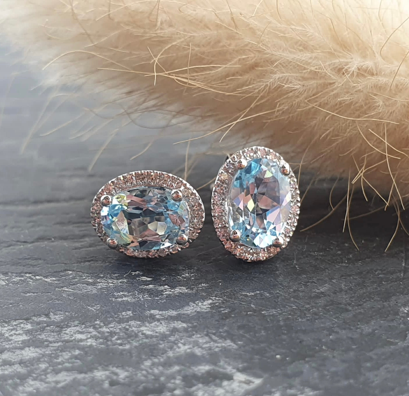 Blue topaz oval halo stud earrings
