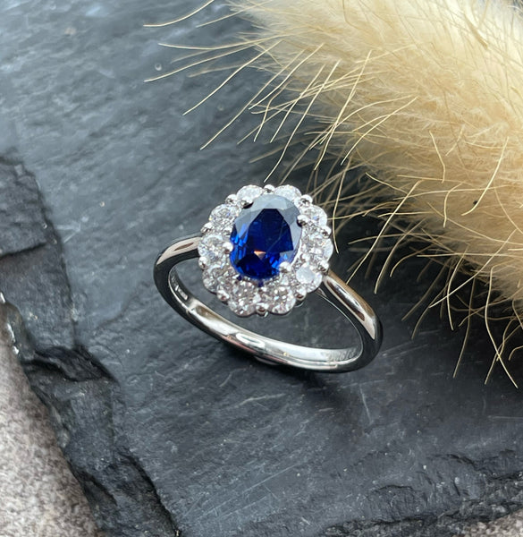 Oval sapphire cluster ring