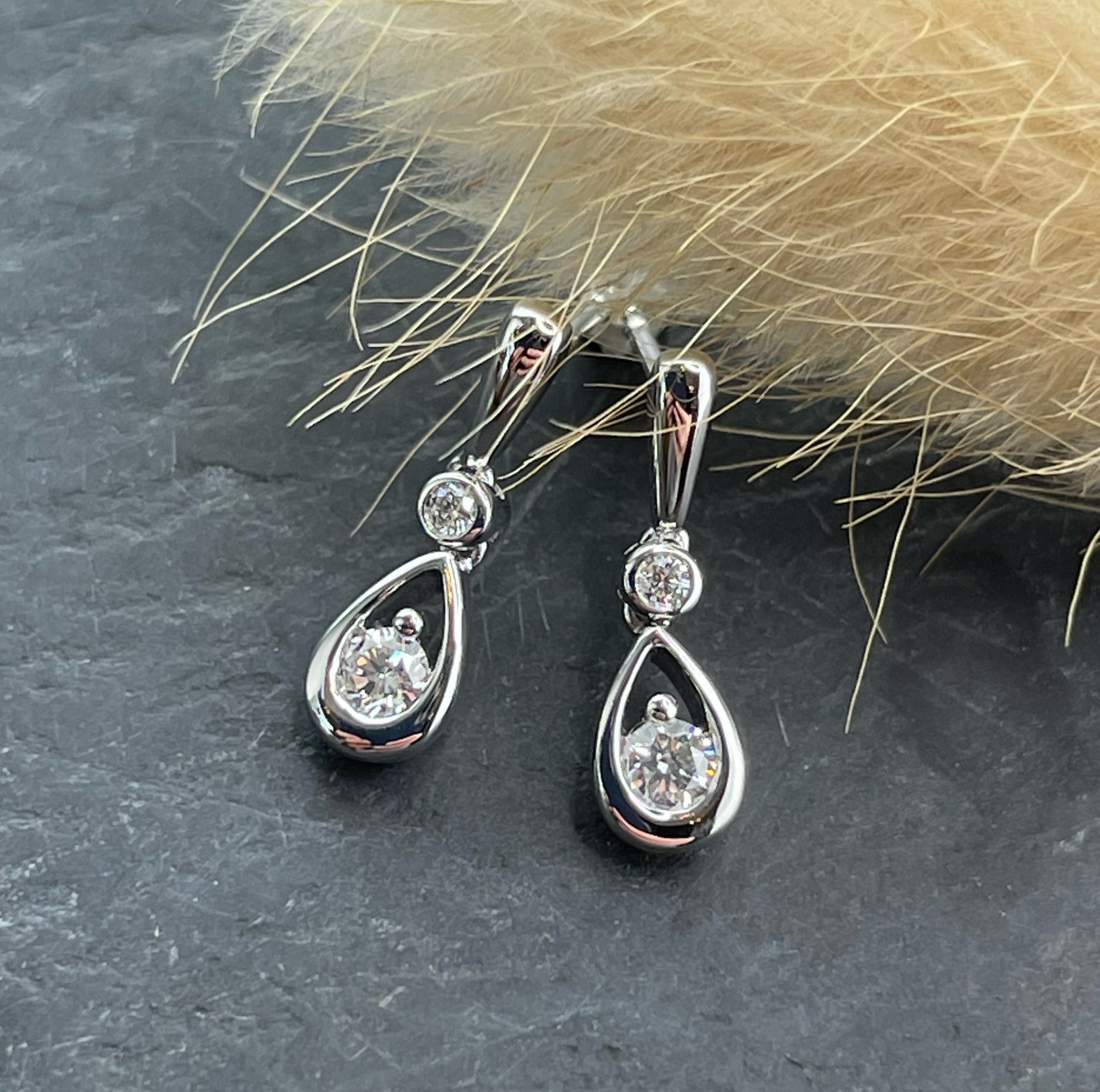 Open teardrop diamond earrings