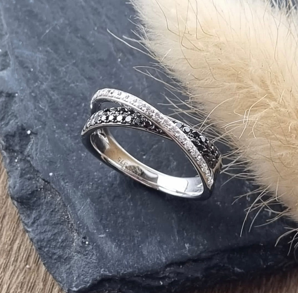 Black and white diamond crossed band