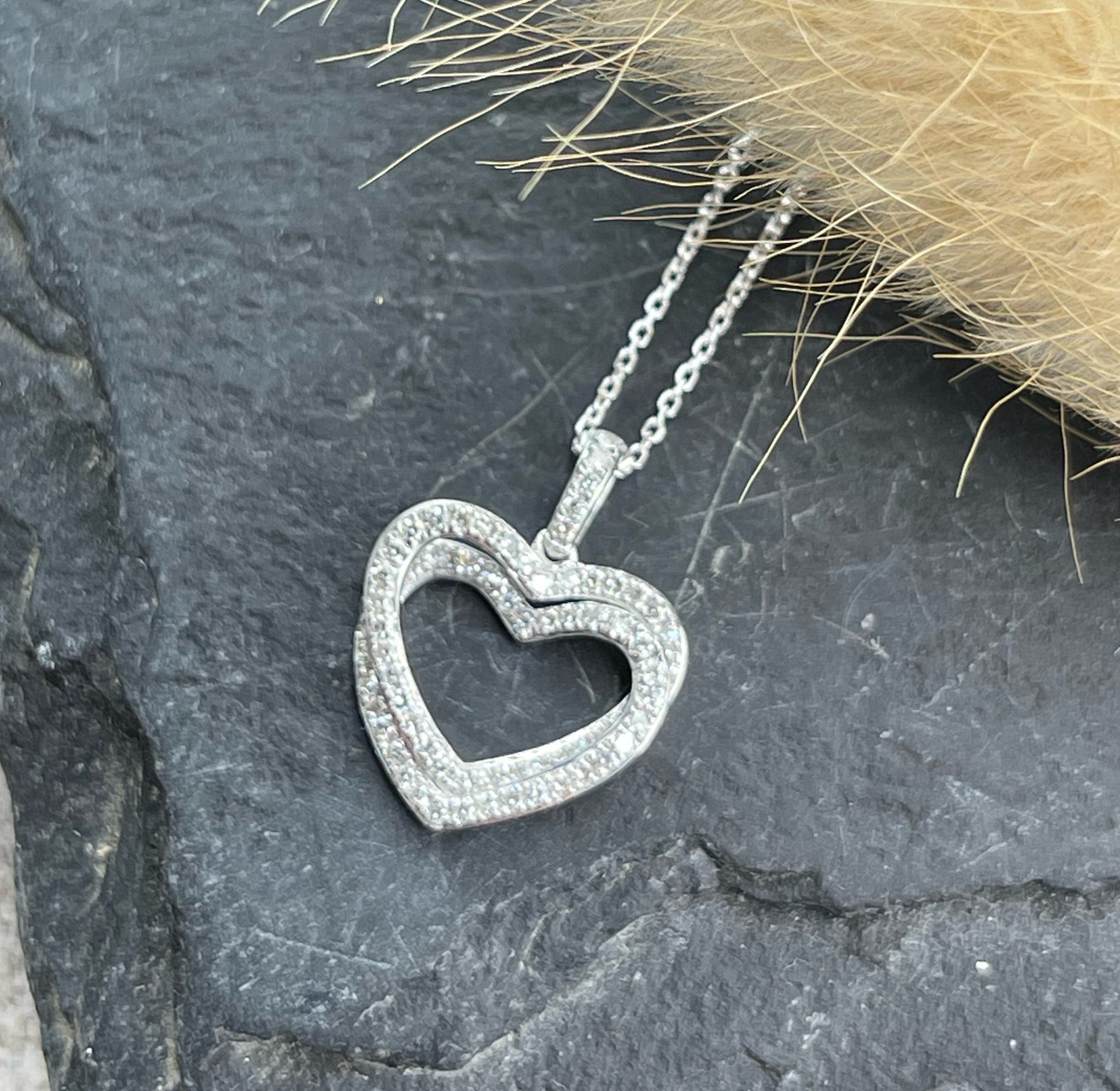 Entwined diamond heart pendant