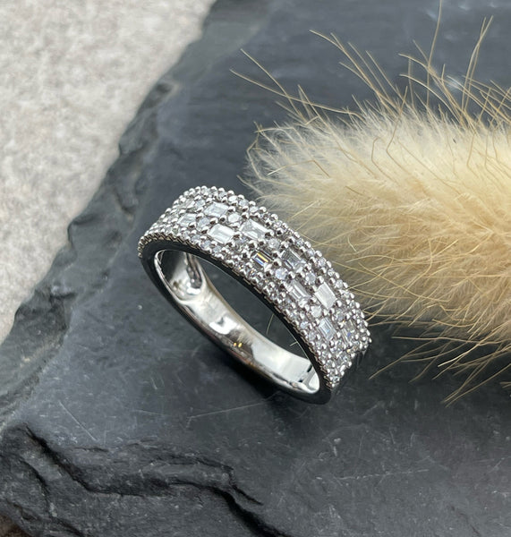 Baguette and round diamond dress ring